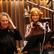 Carole and Reba record vocal tracks. Photo by Glenn Sweitzer